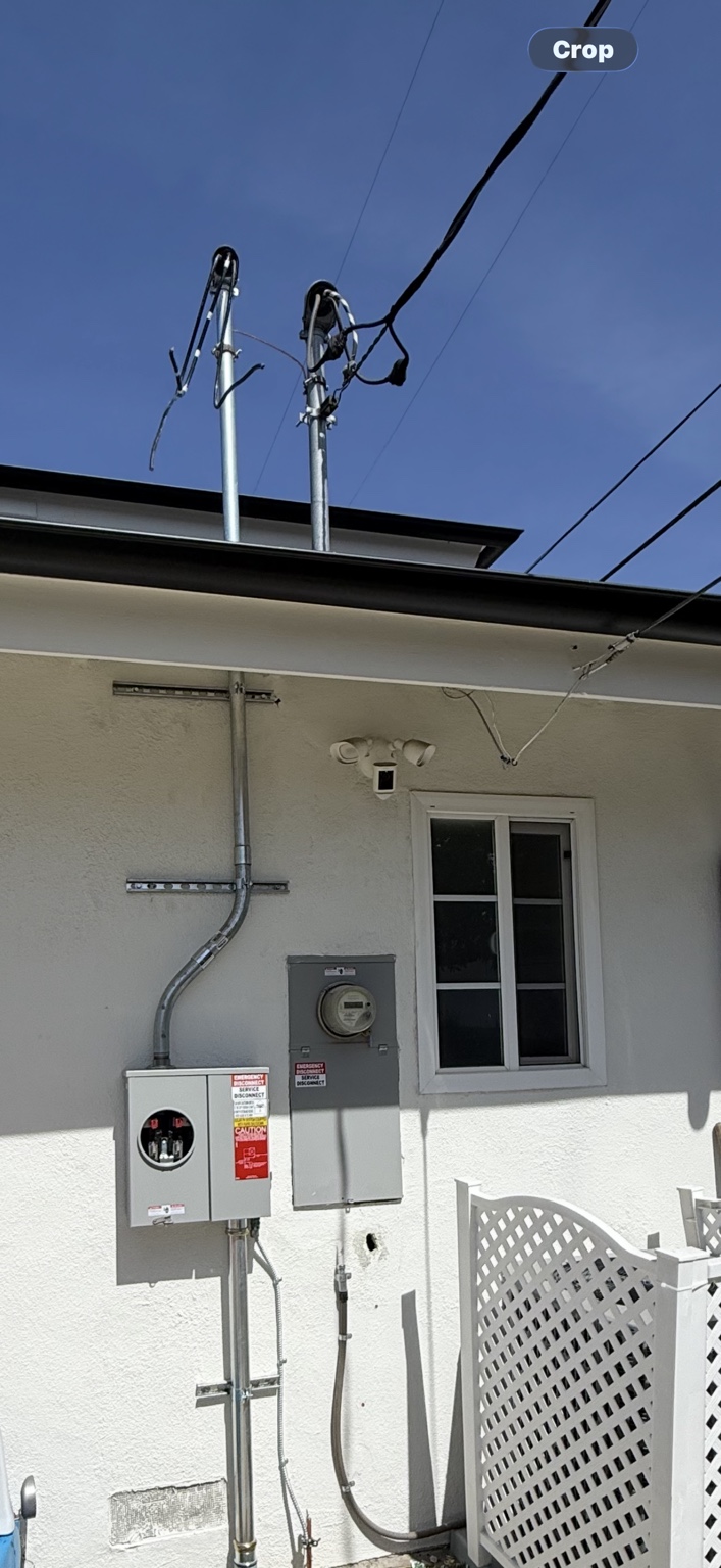 New exterior service conduit and meter equipment during installation