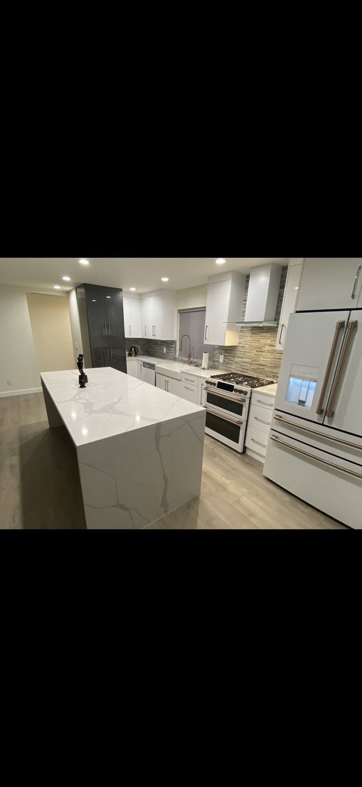 Finished kitchen with recessed and under-cabinet lighting